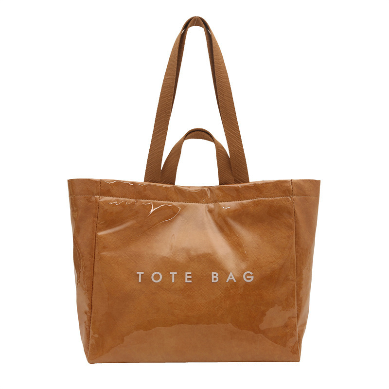 2025 New free delivery designer's bag DuPont Paper Jelly Tote Large Capacity PVC Waterproof Handbag Commuter Mommy Single Shoulder Bag