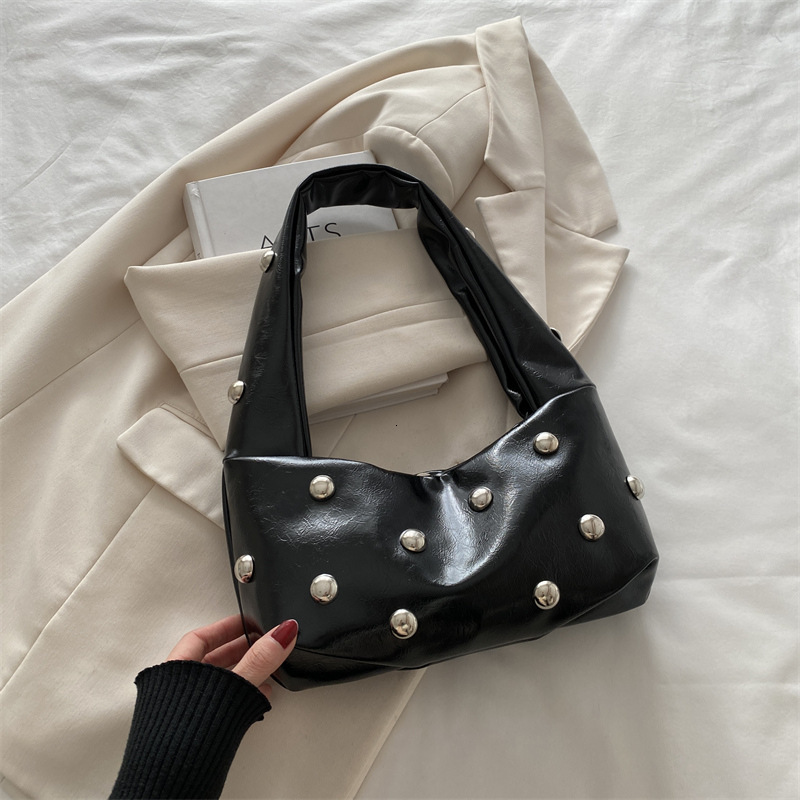 2025 New Trendy New Free Delivery Designer Bag And Fashionable Summer Armpit Bag With Niche Design Luxury Bag Single Shoulder Personalized Crossbody W