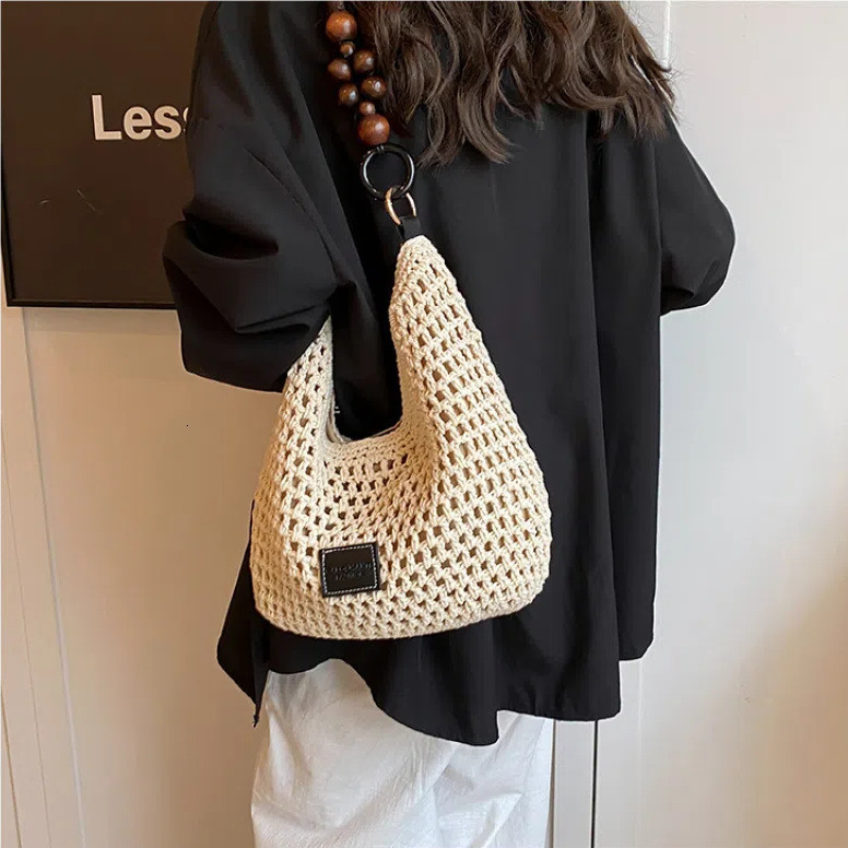 Beach vacation beach woven for women 2025 new hollow knitted handbag, large capacity single shoulder armpit bag