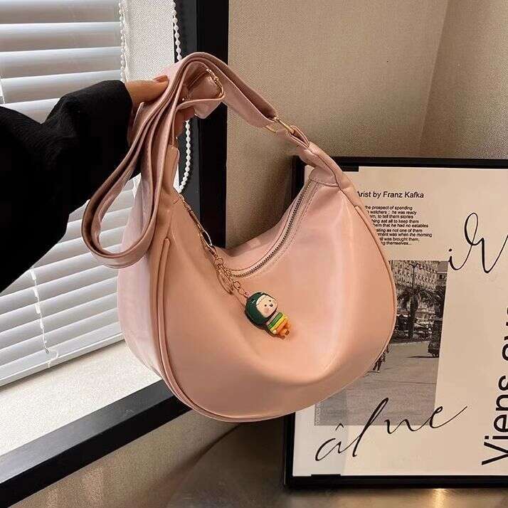 Real leather high-end handbag 2025 new sports and leisure lazy style dumpling for women crossbody shoulder crescent shaped bag