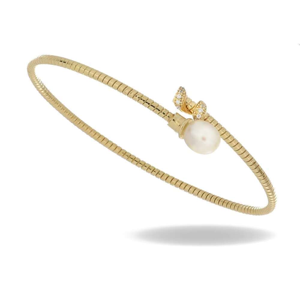 An old bracelet made in Italy, featuring sparkling pearls and exquisite paving details