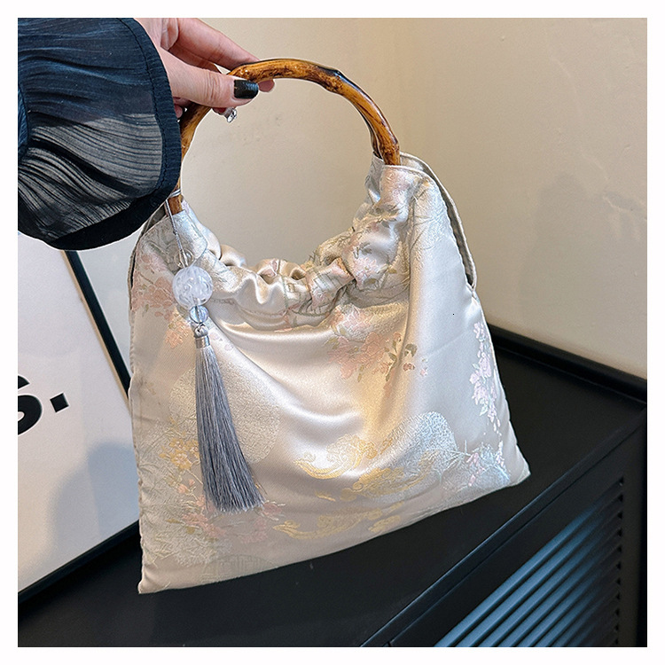 2025 new bag, new Chinese style horse face skirt, qipao, Hanfu, ancient rattan weaving, hand-held bamboo designer, ethnic style, handmade jacquard bag