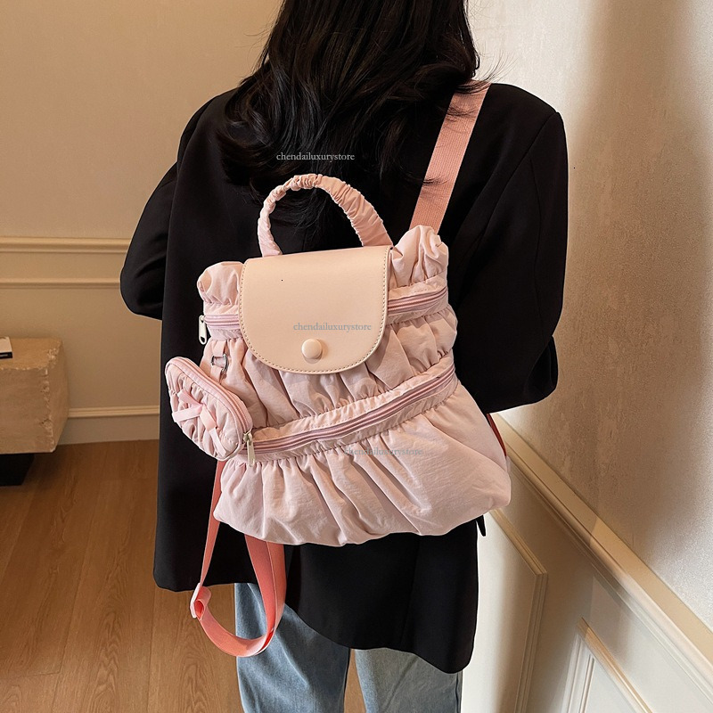 2025 Free Shipping Designer Bag Women's Backpack Sweet And Fashionable Pleated Skirt Handbag Campus Student Backpack Outdoor Travel Vacation Back