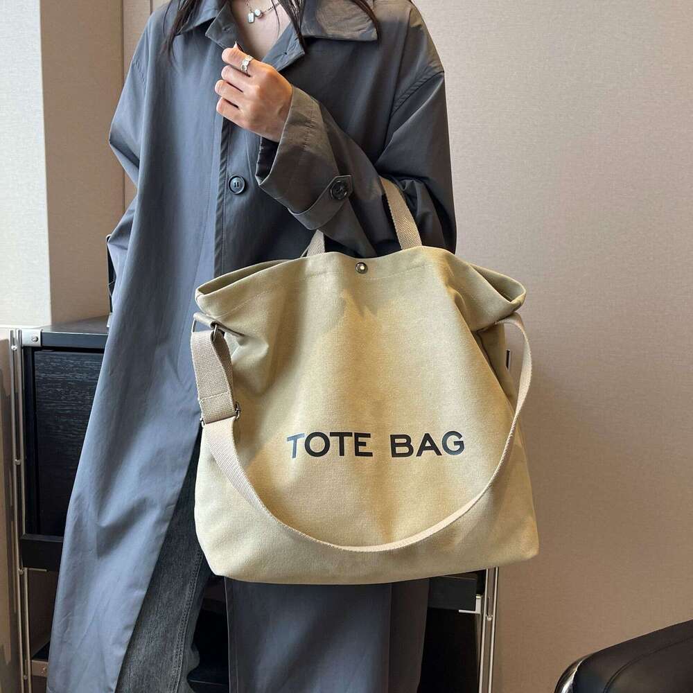 Thick canvas vintage tote high-end handbag commuting large capacity student backpack shoulder bag 2025 new style chic and elegant temperament