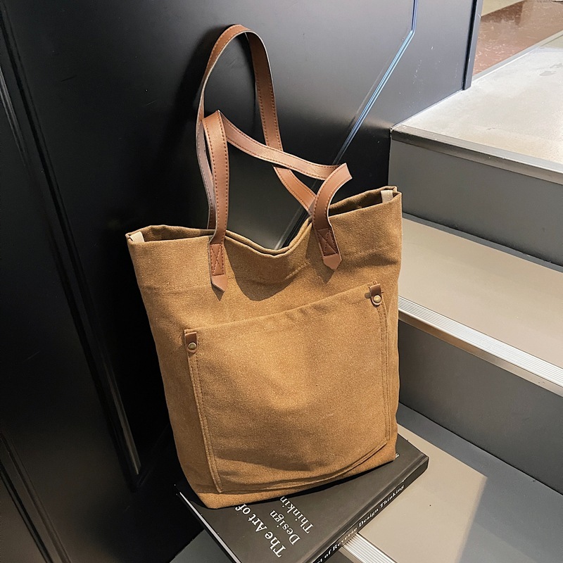 Canvas men's large capacity handheld 2025 new fashion spring simple shoulder bag versatile casual tote for women