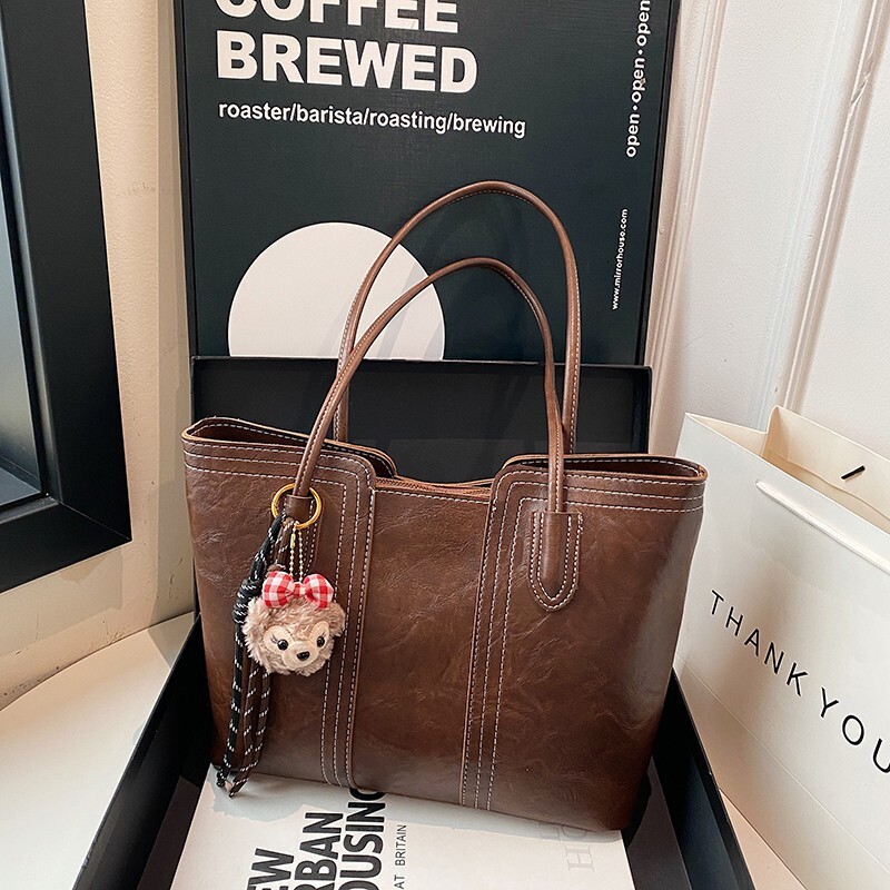 2025 new bag, women's simple large capacity, 2025 new multifunctional shoulder designer bag, college student class bag, commuting handbag, undera