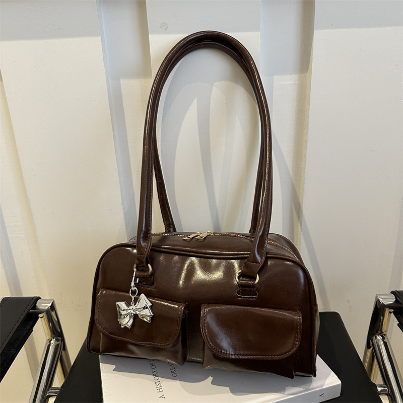 American Fashion Handheld Bowling 2025 New Fashionable Versatile Shoulder High Beauty New Free Delivery Luxury Bag Designer Bag Casual Women's Ba