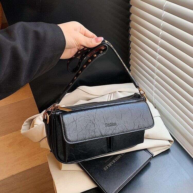 casual texture solid color commuting fashion underarm single shoulder rivet large capacity high-end feel bag