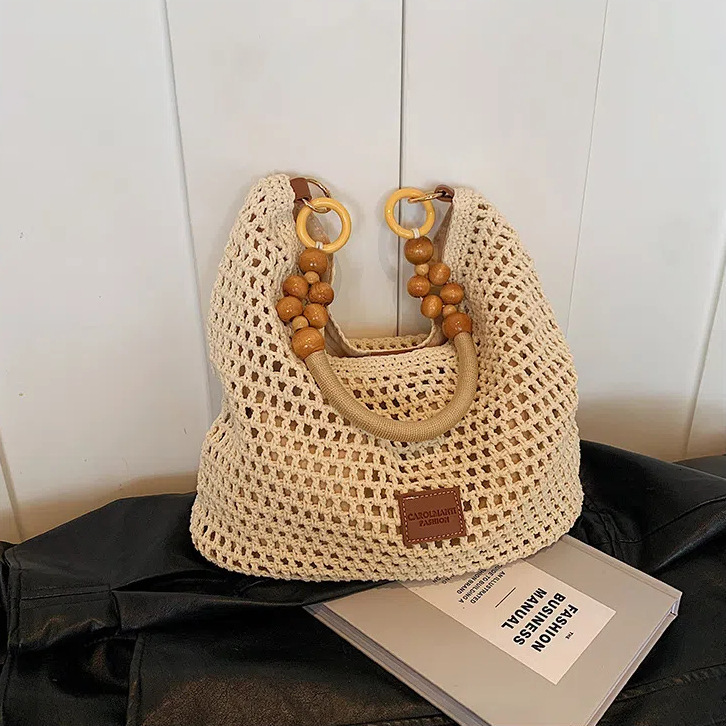Beach vacation beach woven for women 2025 new hollow knitted handbag, large capacity single shoulder armpit bag