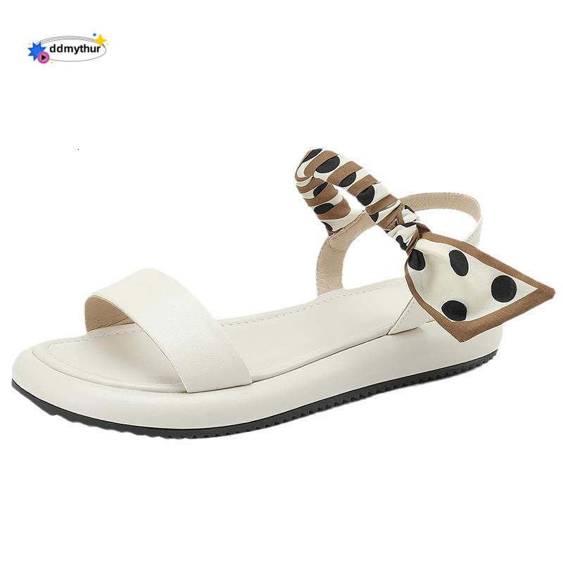 Sandals women in summer 2025, perfect for outdoor wear. This year's new style features Roman shoe with flat bottom and a thick sandy sole that fe