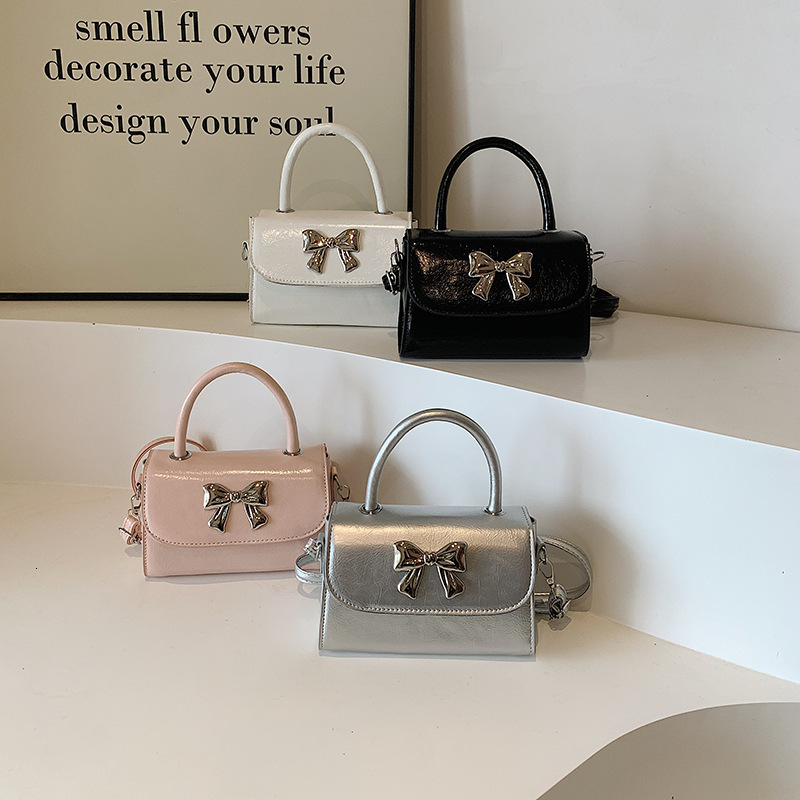 2025 New Free Delivery Designer's Bag Pink Hand-held Bow For Women New Summer Single Shoulder Crossbody Bag Niche Fashion Cute Small Square Bag