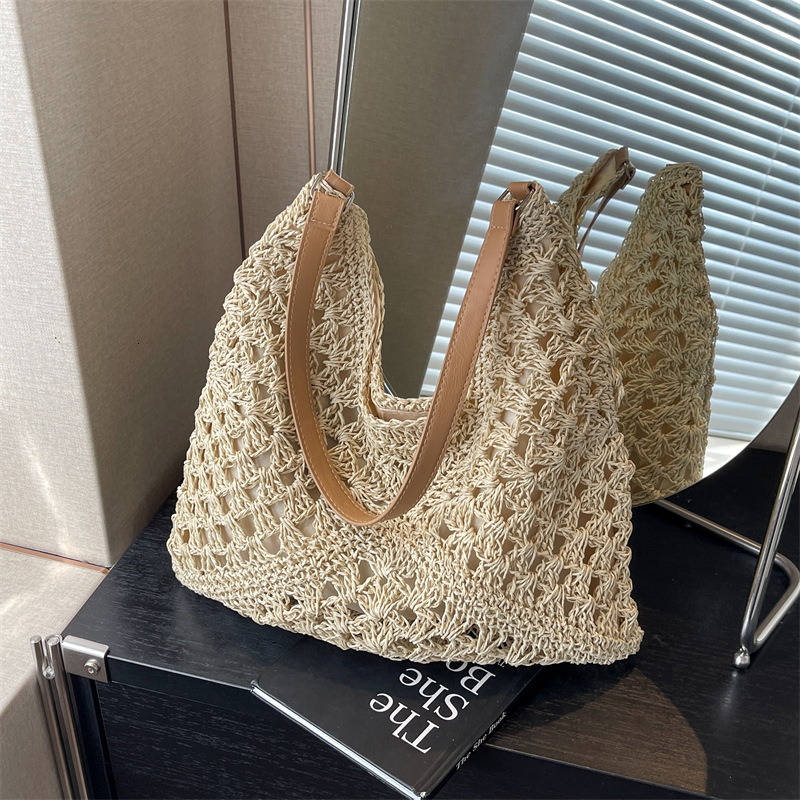 High quality new large capacity women's new summer beach designer vacation grass woven multifunctional retro versatile commuting shoulder bag arm