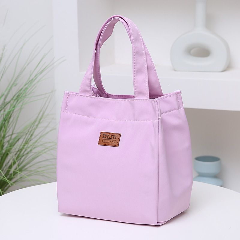 Free shipping 2025 new designer bag Top quality Brand High Quality New Style Delivery Designer Bag large capacity simple bento for going out to work w