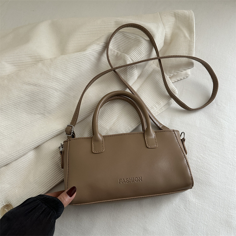 Minimally Handheld Small Square 2025 Spring And Summer New Style New Free Delivery Designer Bag High End Luxury Bag Fashion Shoulder Korean Edition Ni