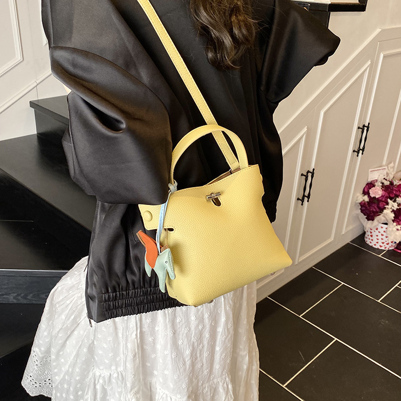 Designer Handbag Korean Niche Design Simple Hand Held Commuting Bag Women S Summer Versatile New Fashion Crossbody Bucket Bag Mini Storage Bag Free Sh