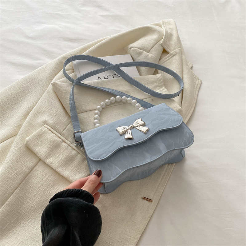 Free Delivery Designer Bag 2025 Fashion Pearl Handheld Stylish Solid Color Design Fresh Butterfly Texture Crossbody Bag Luxury Bag