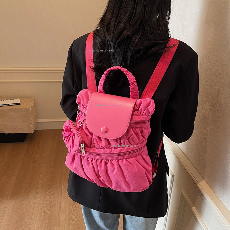 2025 Free Shipping Designer Bag Women's Backpack Sweet And Fashionable Pleated Skirt Handbag Campus Student Backpack Outdoor Travel Vacation Back