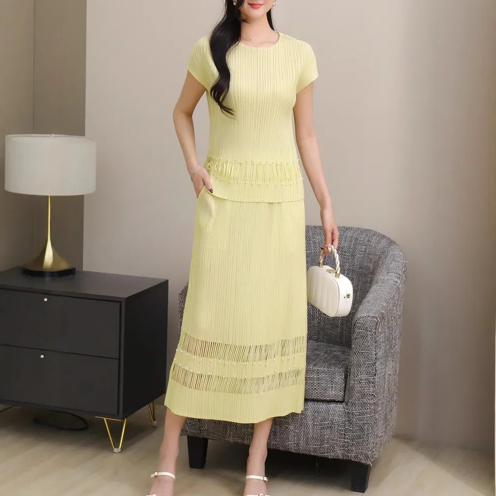 Miyake Style Pleated Fashionable Casual and Versatile Suit for Women Summer Round Neck Top Hollow Skirt Twopiece Set 250514