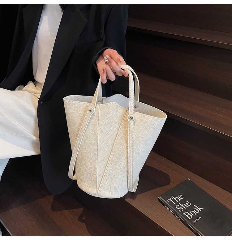 Light luxury niche high-end handbag women's 2025 new super hot water bucket vegetable basket versatile single shoulder crossbody bag