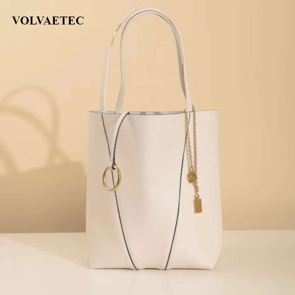 VOAETEC High Sense Fashion Trend 2025 Early Spring New Women's Leather Texture Clutch Underarm Shoulder Bag Metal Pendant