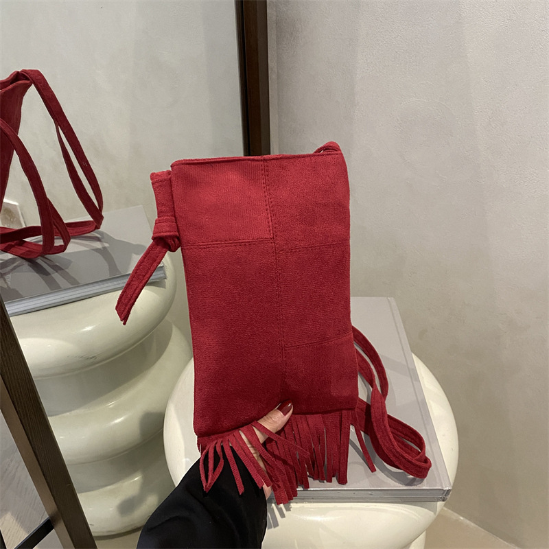 2025 Luxury Bag Suede Niche New Free Delivery Designer Bag Design New Women's Bohemian Style American Tassel Bag Frosted Crossbody