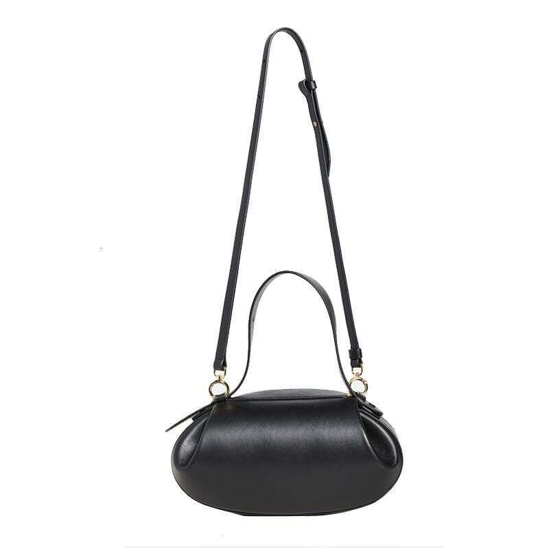 Niche popular 2025 crossbody casual versatile three-dimensional women's armpit small round French stick bag handbag