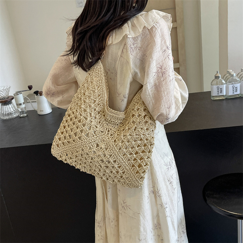 High quality new large capacity women's new summer beach designer vacation grass woven multifunctional retro versatile commuting shoulder bag arm