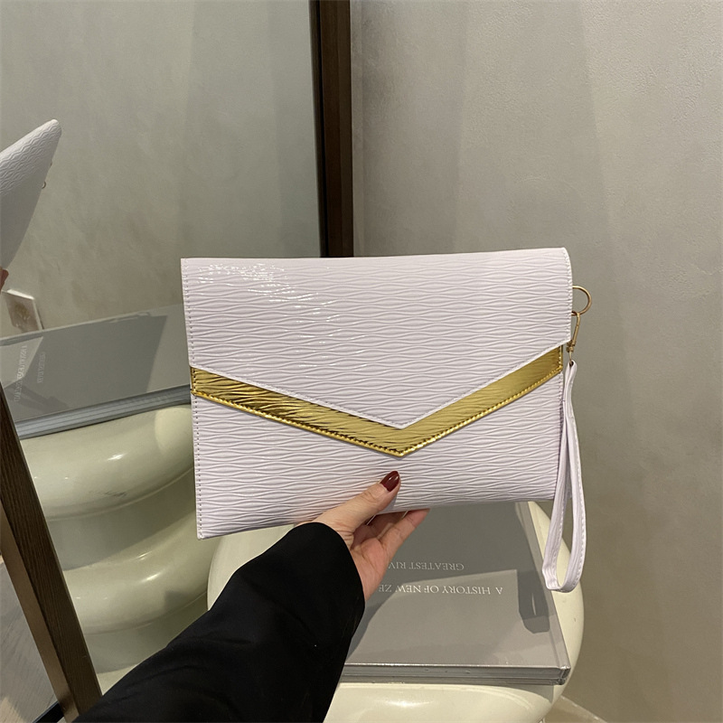 Luxury Bag Spring And Summer Handheld Envelope 2025 Western Korean Edition Personalized Fashion Casual New Free Delivery Designer Bag Style Color Cont