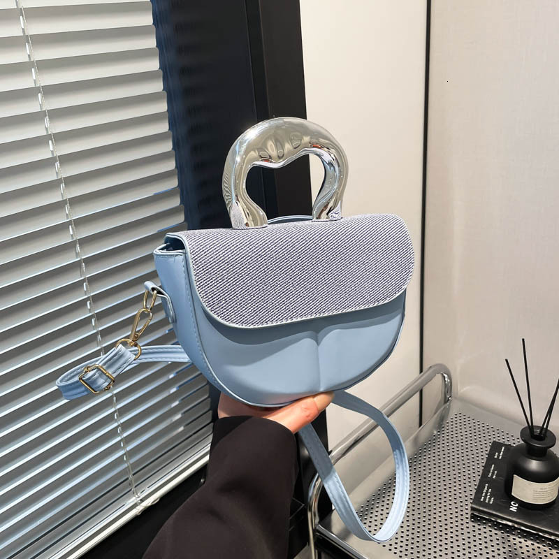 Spring and summer new 2025 shoulder women's trend simple luxury bag saddle bag highend texture splicing design crossbody bag New Free Delivery De