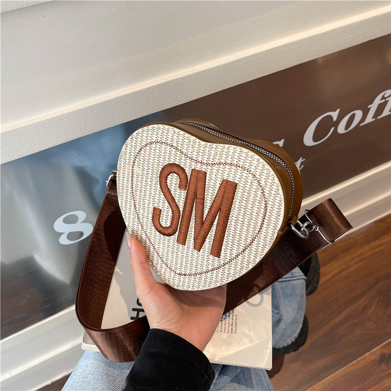 2025 New Niche Design Heartshaped Peach Shaped Luxury Bag Shoulder Crossbody Bag New Free Delivery Designer Bag Trendy Casual Letter Women's Bag