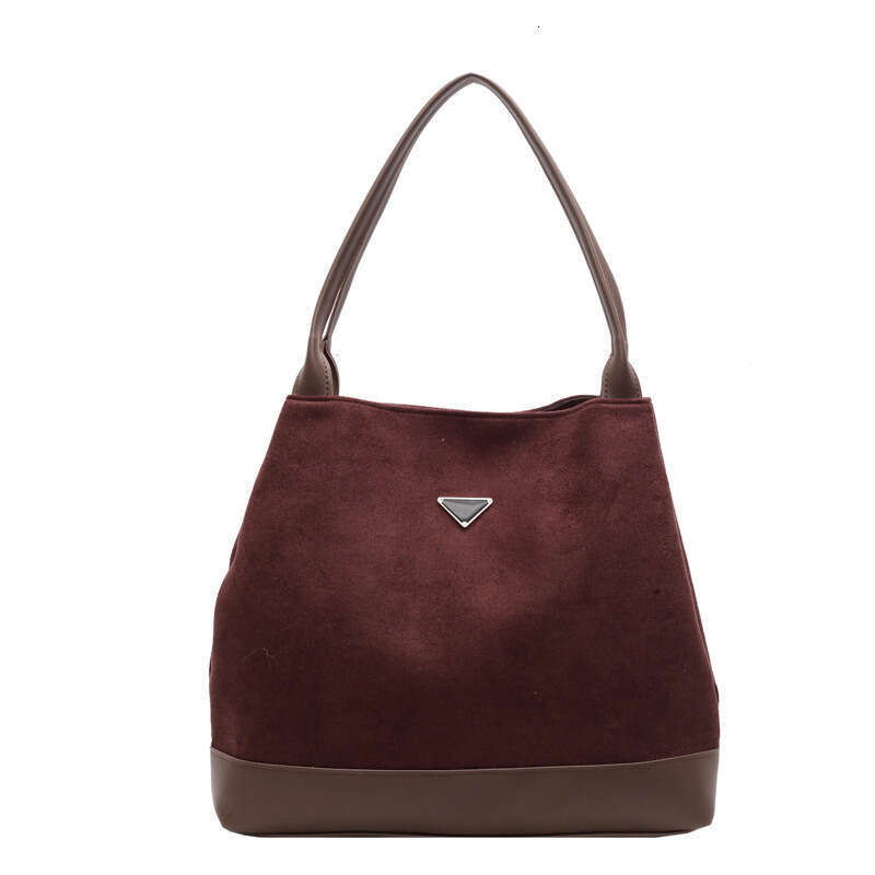 New retro shoulder women's Korean version, tote large capacity bag, veet leather handbag, color blocked, 2025 new style, unique and elegant tempe