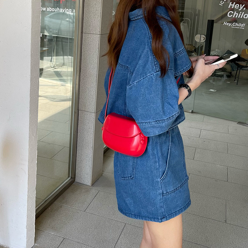 High quality new free delivery bag 2025 summer new Korean version designer red saddle slanted small women's multifunctional simple phone bag