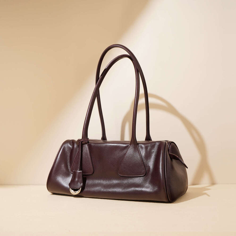 Single Shoulder Armpit Baguette For Women 2025 New High-End Triangle Bag Hand-Held Crossbody Bowling Bag