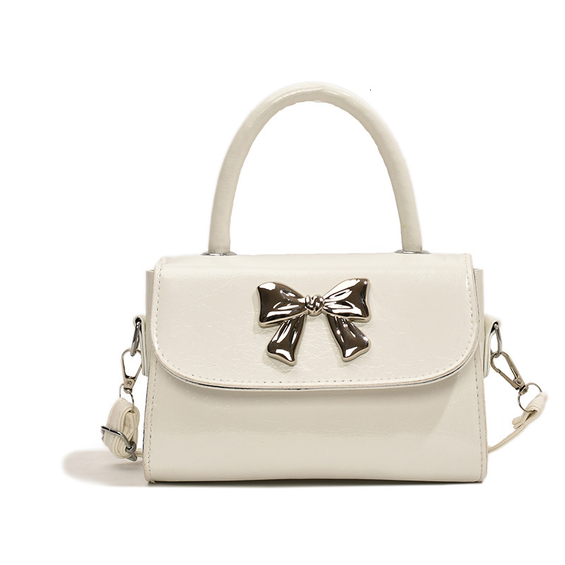 2025 New Free Delivery Designer's Bag Pink Hand-held Bow For Women New Summer Single Shoulder Crossbody Bag Niche Fashion Cute Small Square Bag