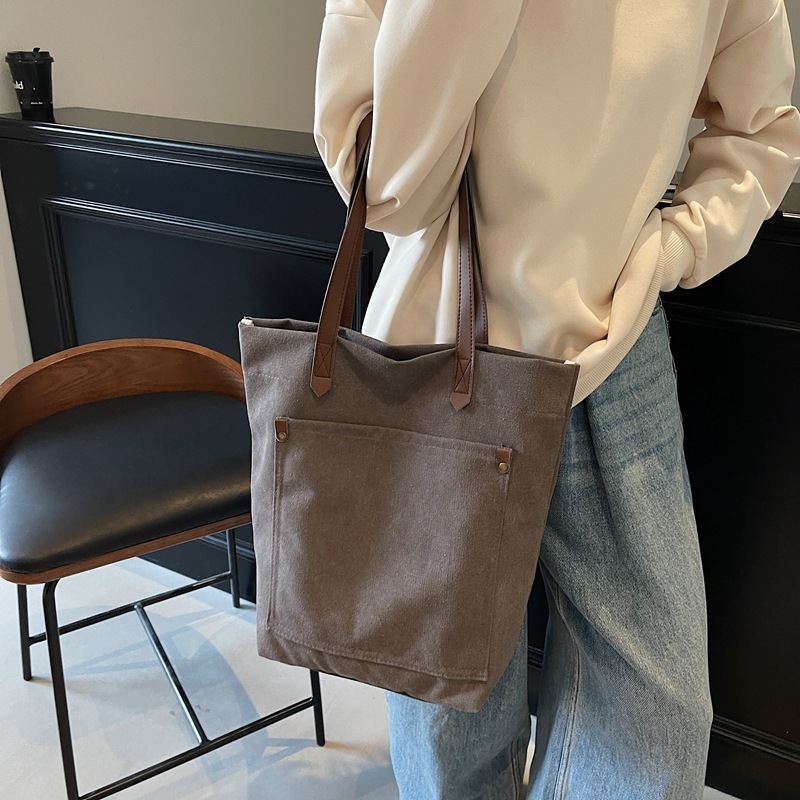 Canvas men's large capacity handheld 2025 new fashion spring simple shoulder bag versatile casual tote for women