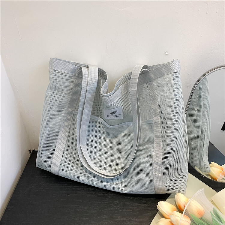 Free shipping 2025 new designer bag Handbag Transparent Shopping Swimming Nylon Mesh Fitness Large Capacity Shoulder Bag for Women