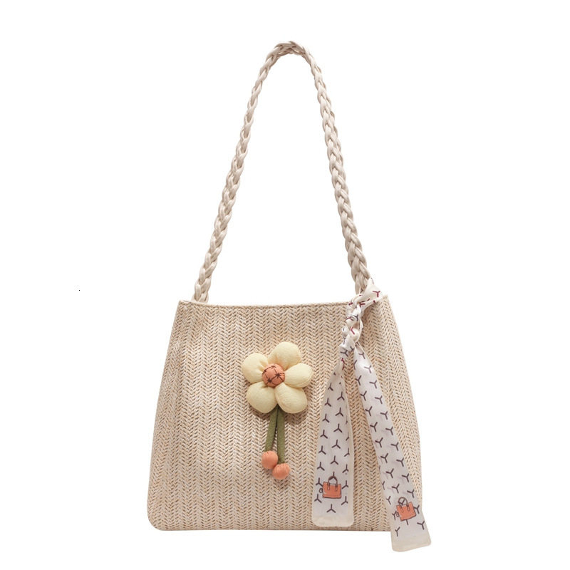A new designer bag woven for women in the summer of 2025, featuring a large capacity seaside vacation single shoulder slanted transportation tote bag