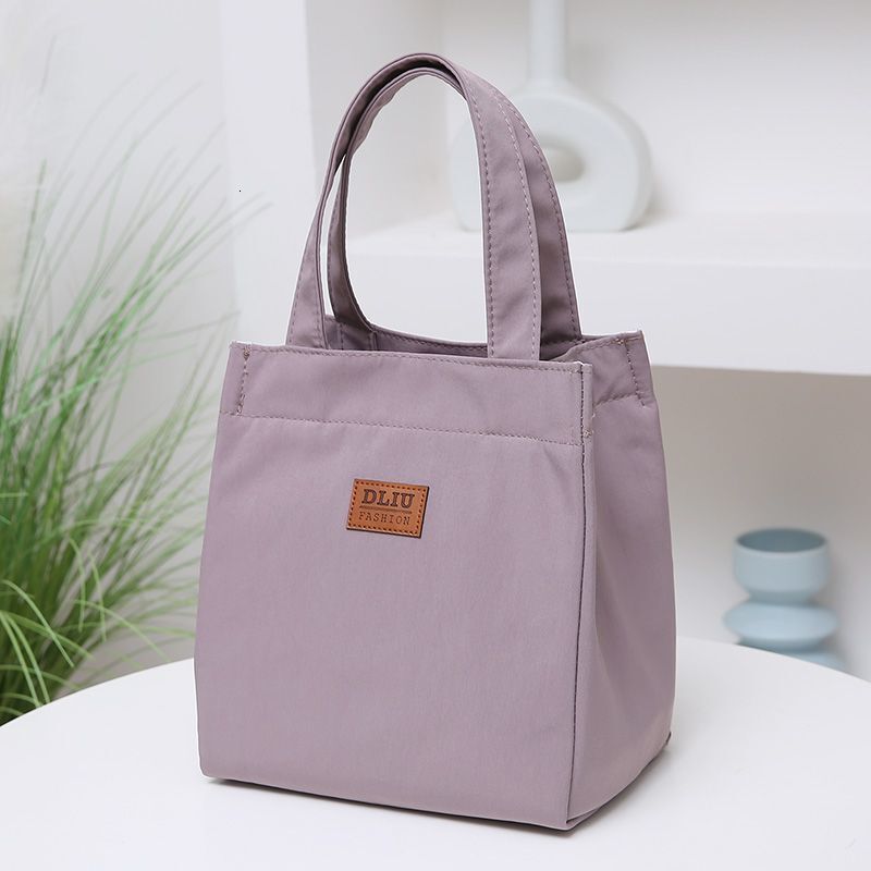 Free shipping 2025 new designer bag Top quality Brand High Quality New Style Delivery Designer Bag large capacity simple bento for going out to work w