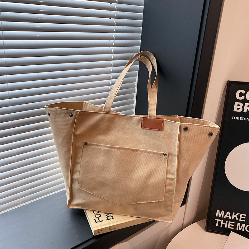 Fashion New Free Delivery Designer Luxury Bag Bag Canvas Handbag Women's Large Capacity Casual Shoulder Commuting Bag