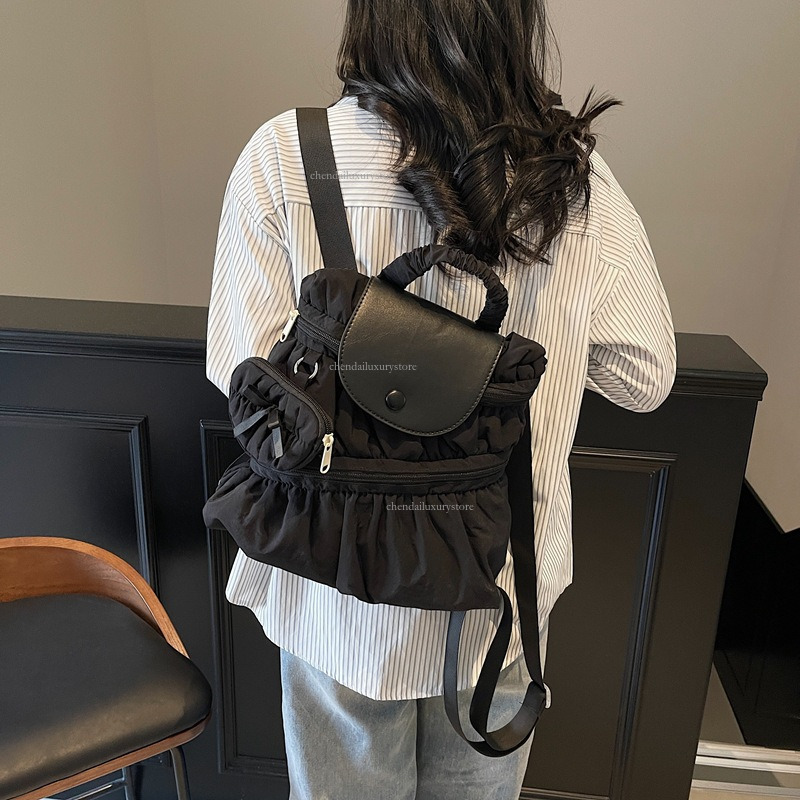 2025 Free Shipping Designer Bag Women's Backpack Sweet And Fashionable Pleated Skirt Handbag Campus Student Backpack Outdoor Travel Vacation Back
