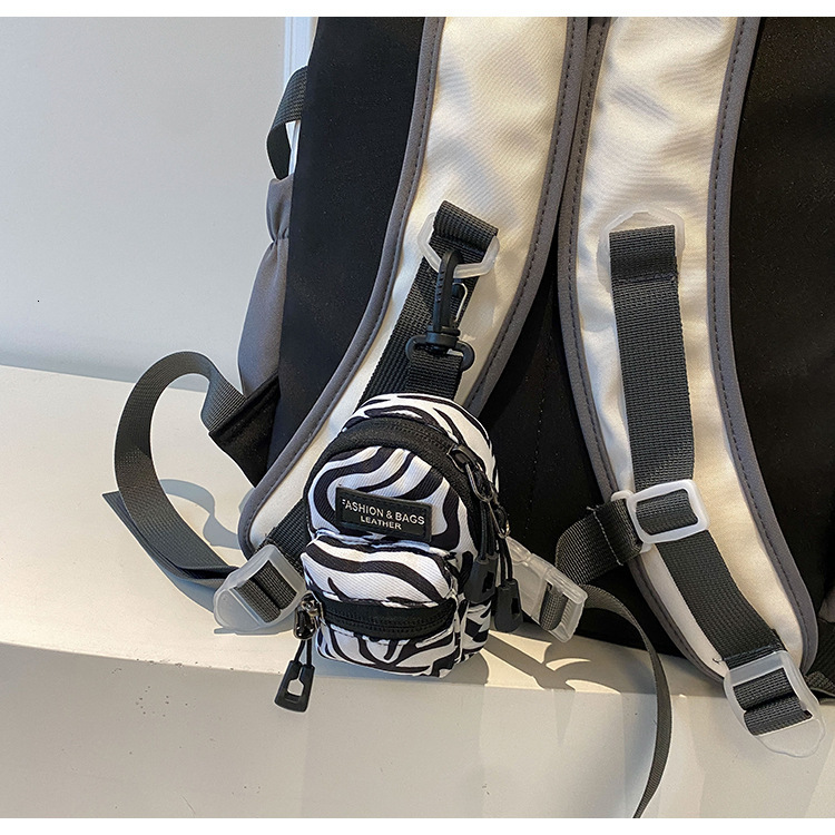 2025 Designer Bag New Fashionable Lipstick Headphone Storage Mini Bag Pendant Bag Niche Design Spotted Ripple Single Shoulder Crossbody Bag Unisex