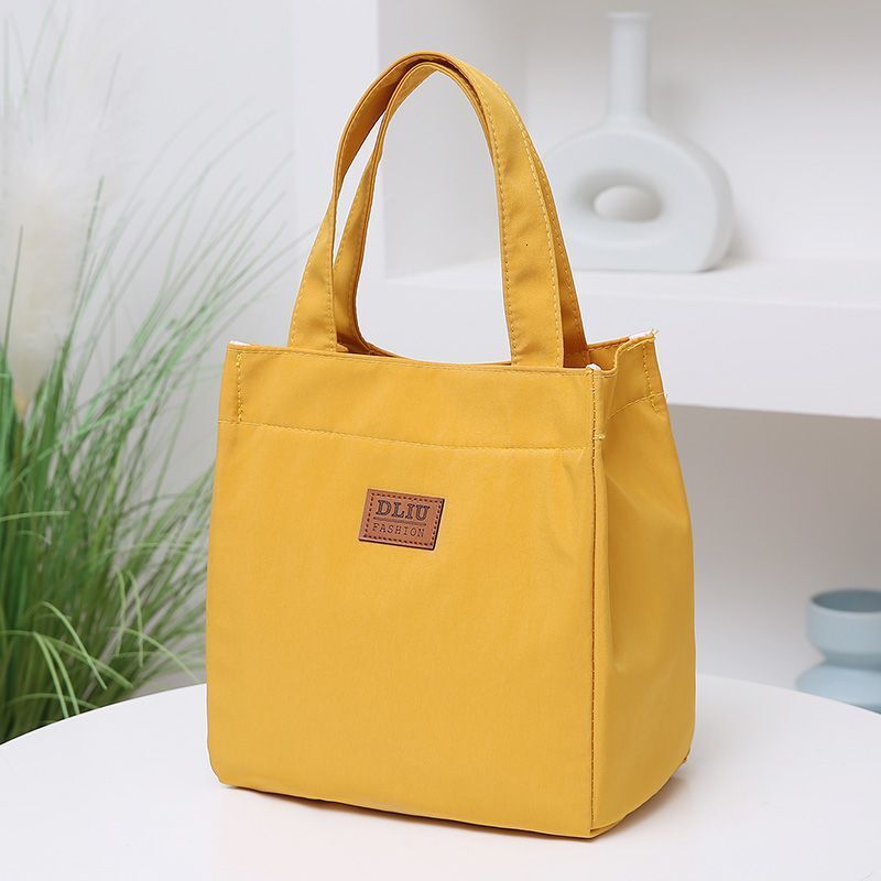 Free shipping 2025 new designer bag Top quality Brand High Quality New Style Delivery Designer Bag large capacity simple bento for going out to work w