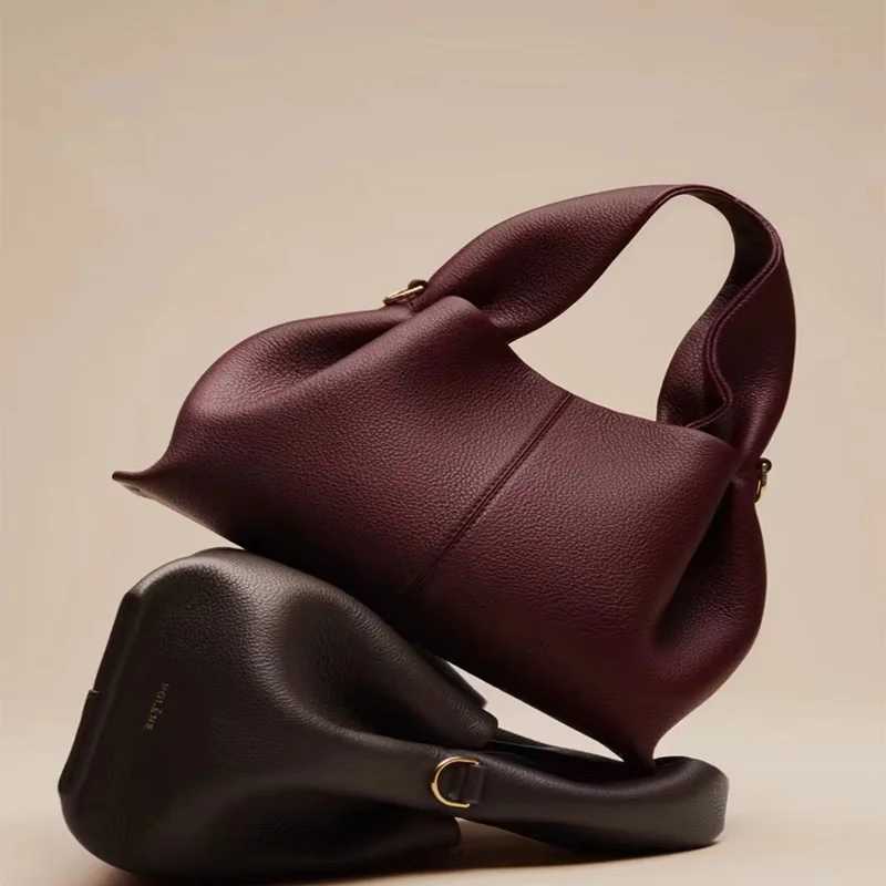 Cross border new product cloud high-end and reliable lychee patter leather and cowhide dumpling hand-held crossbody bag Z250514