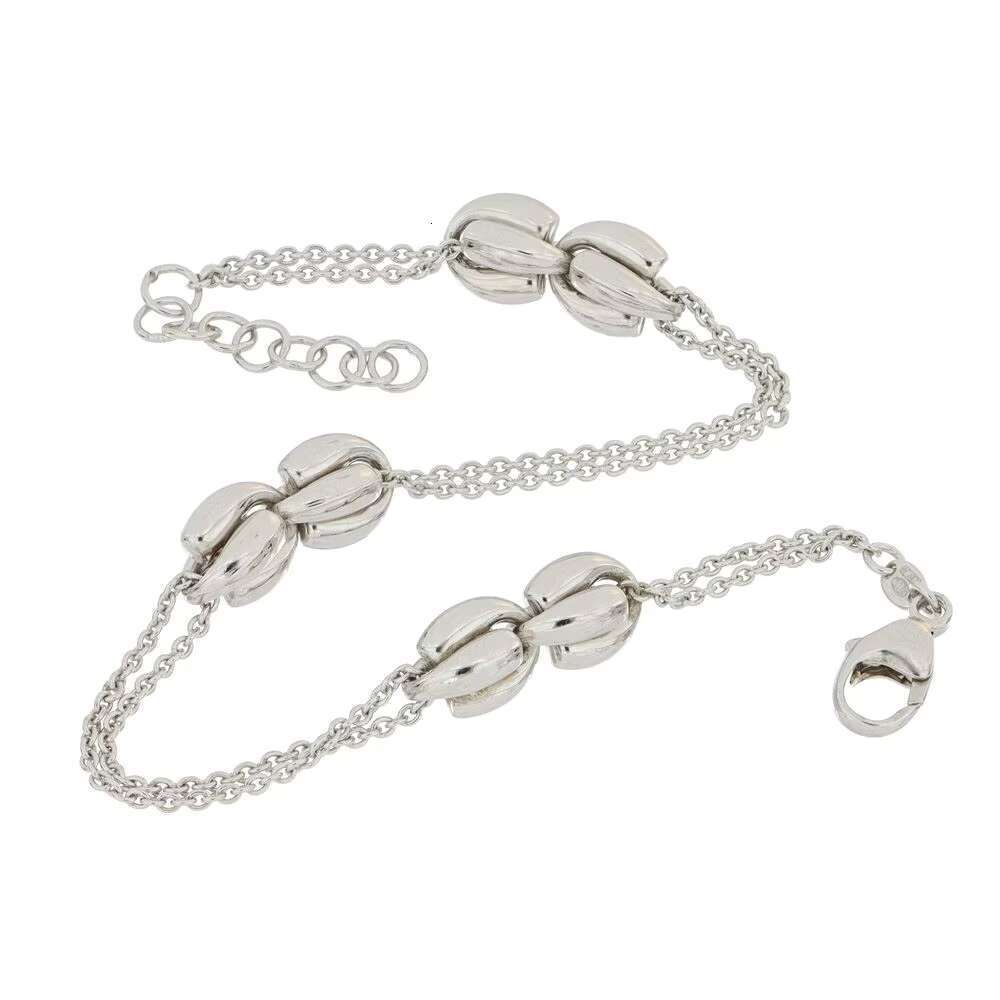 Made in Italy, this pure sier bracelet features a stylish adjustable design with double chain and knot decorations
