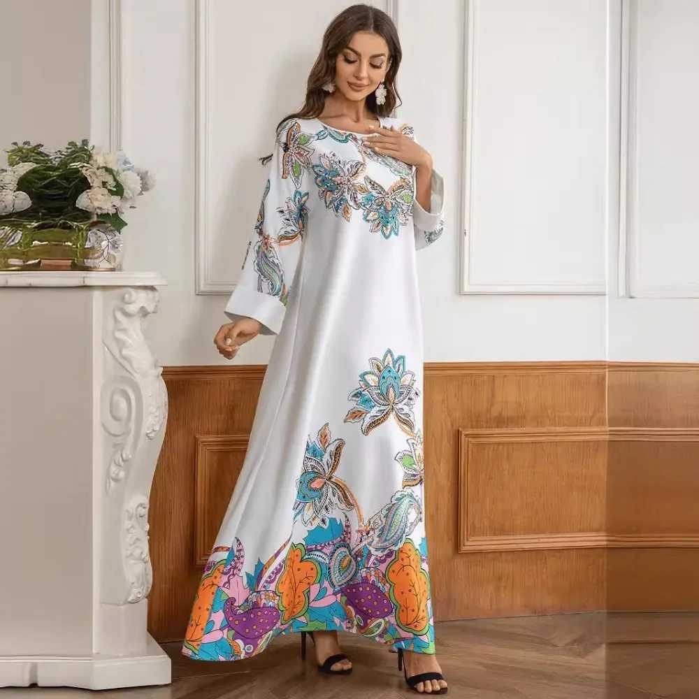 Turkish Muslim ladies elegant abaya It is a new-style printed V-neck dress from Dubai Arabia adorned with dded beads X250514