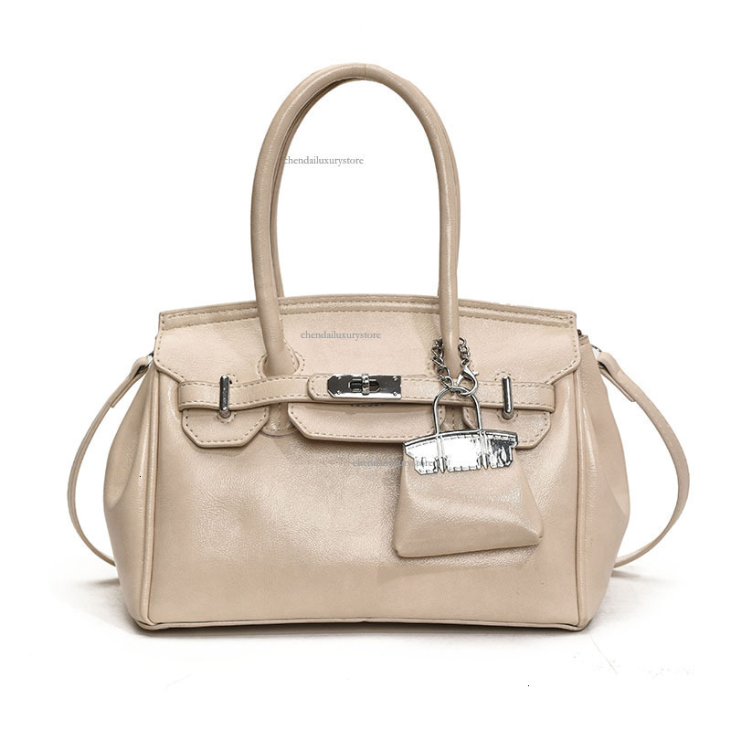 2025 Free Shipping Designer Women's Bag High-end Texture Large Capacity Handbag Fashionable Buckle Strap Single Shoulder Crossbody Bag Casual Com