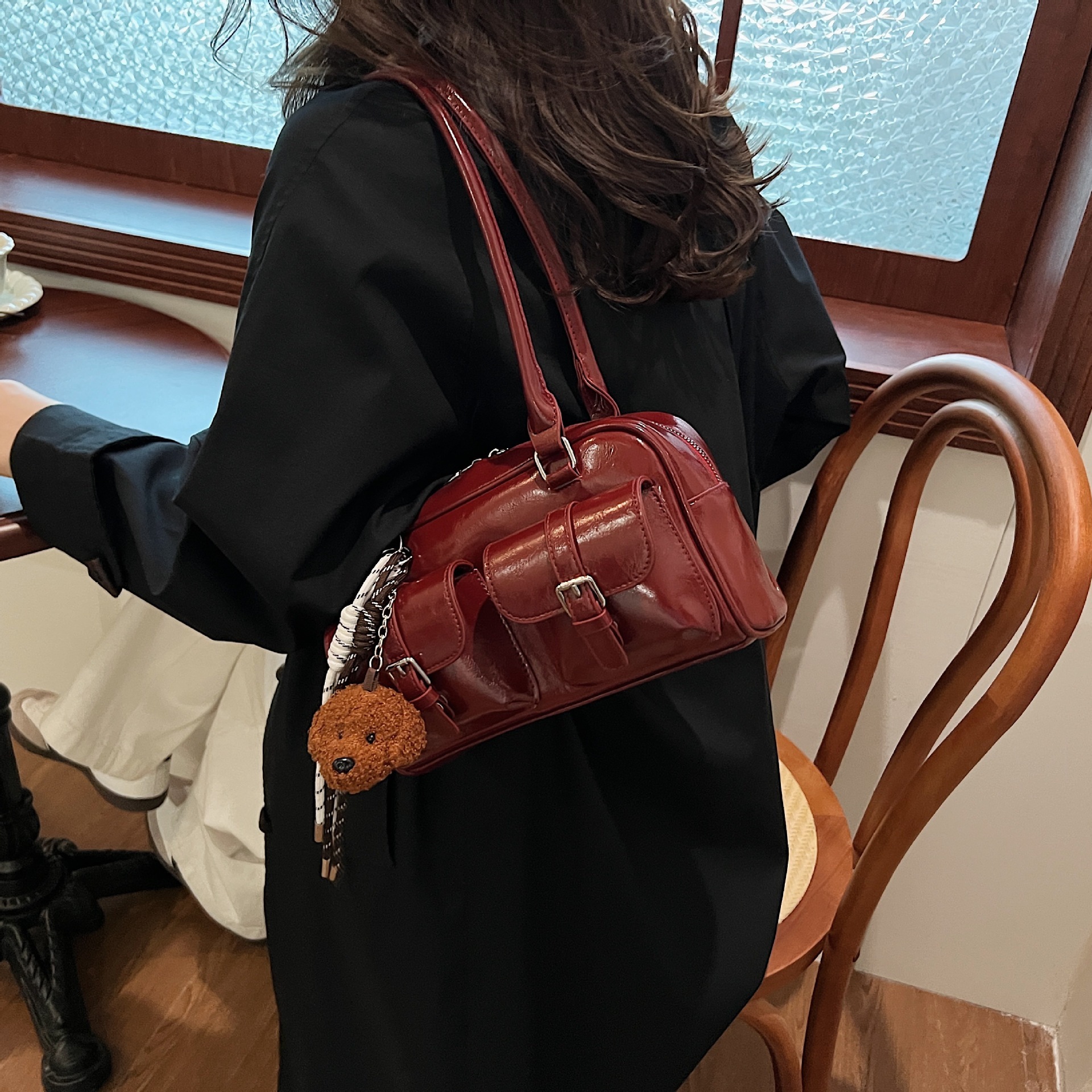 25 year black swan pillow bag, women's new style, light luxury, niche pu, high-end feeling, hand-held bill of lading shoulder bag