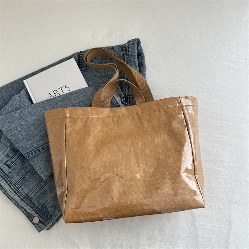 2025 New free delivery designer's bag DuPont Paper Jelly Tote Large Capacity PVC Waterproof Handbag Commuter Mommy Single Shoulder Bag