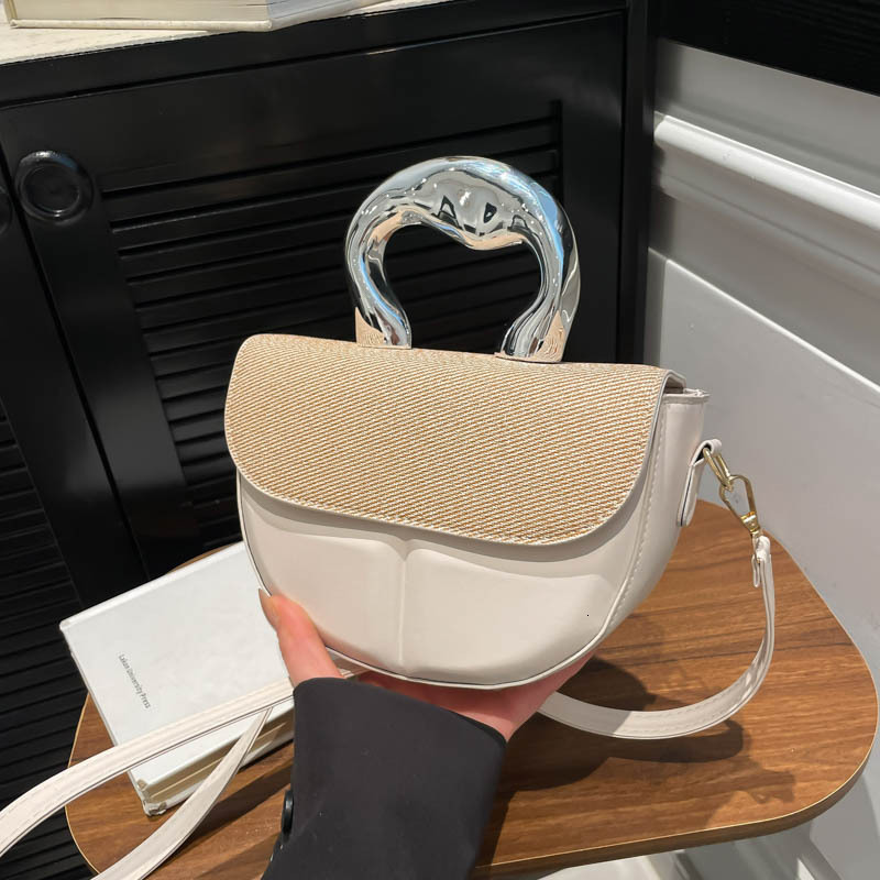 Spring and summer new 2025 shoulder women's trend simple luxury bag saddle bag highend texture splicing design crossbody bag New Free Delivery De