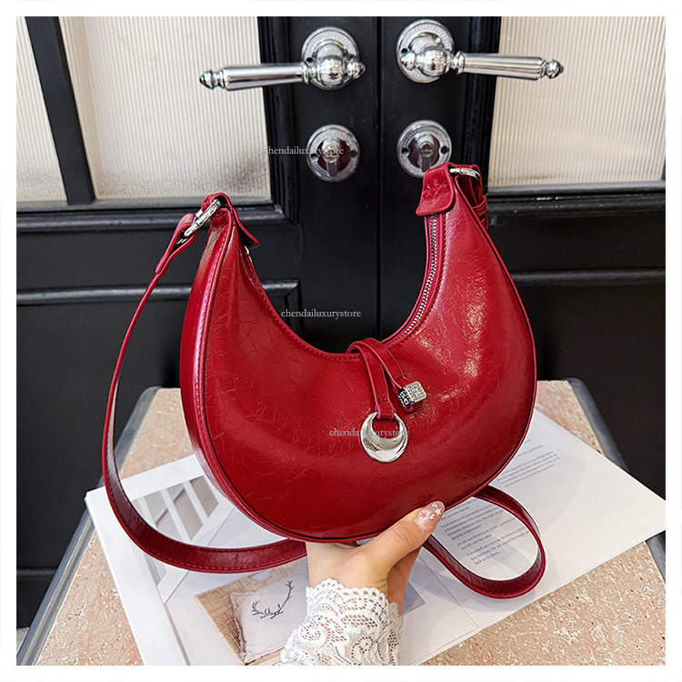 2025 Free Shipping Designer Women's Bag Shoulder Bag Niche New Fashion Simple Armpit Dumpling Bag Crossbody Bag PU Texture Handbag Red Makeup Bag